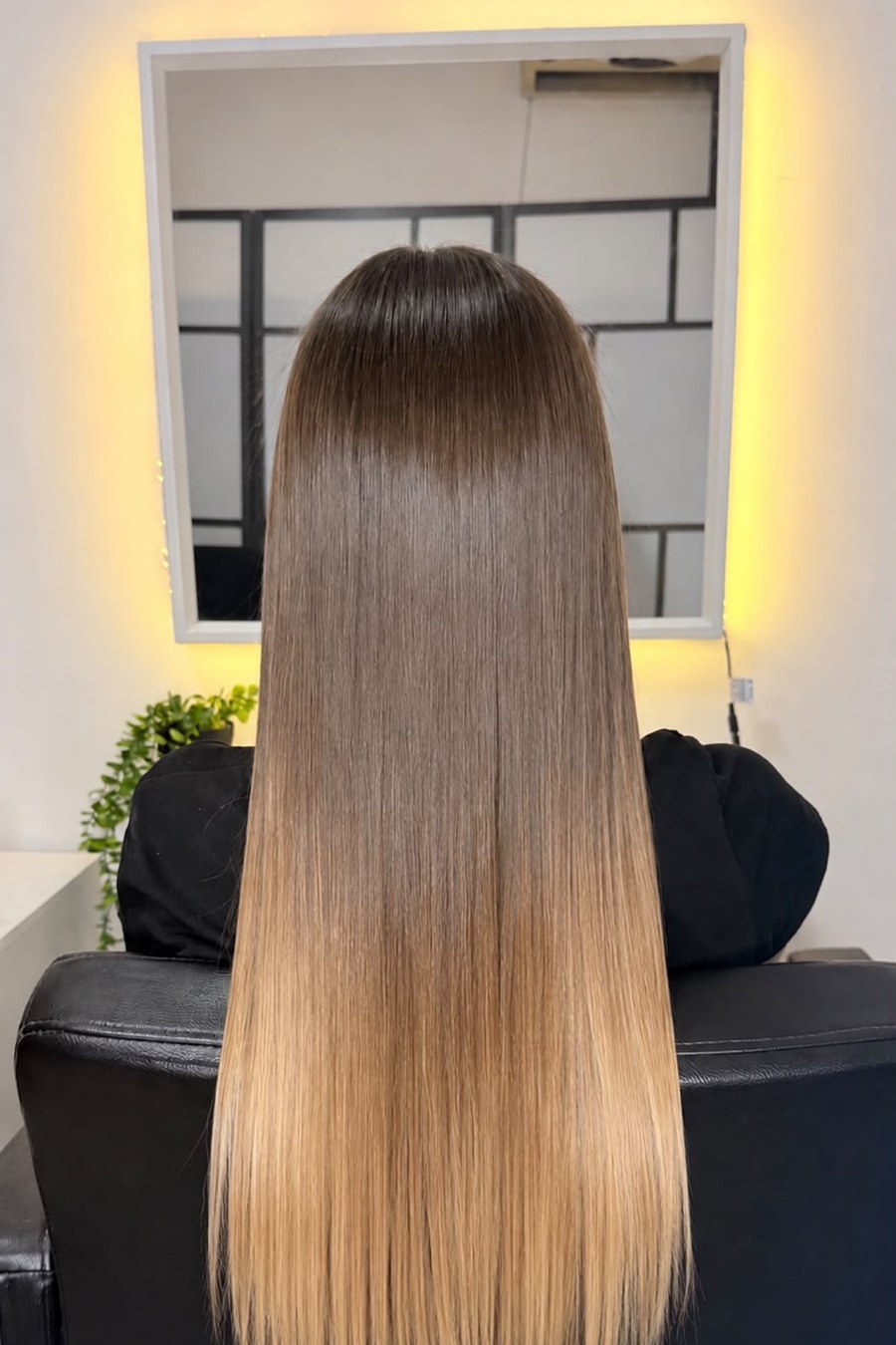 The same ombrֳ© hair after the Fibroseal treatment, smooth with a natural fall